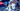 A boy with VR equipment in a virtual reality room
